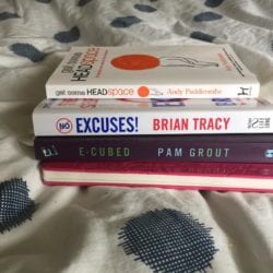 A pile of personal development books